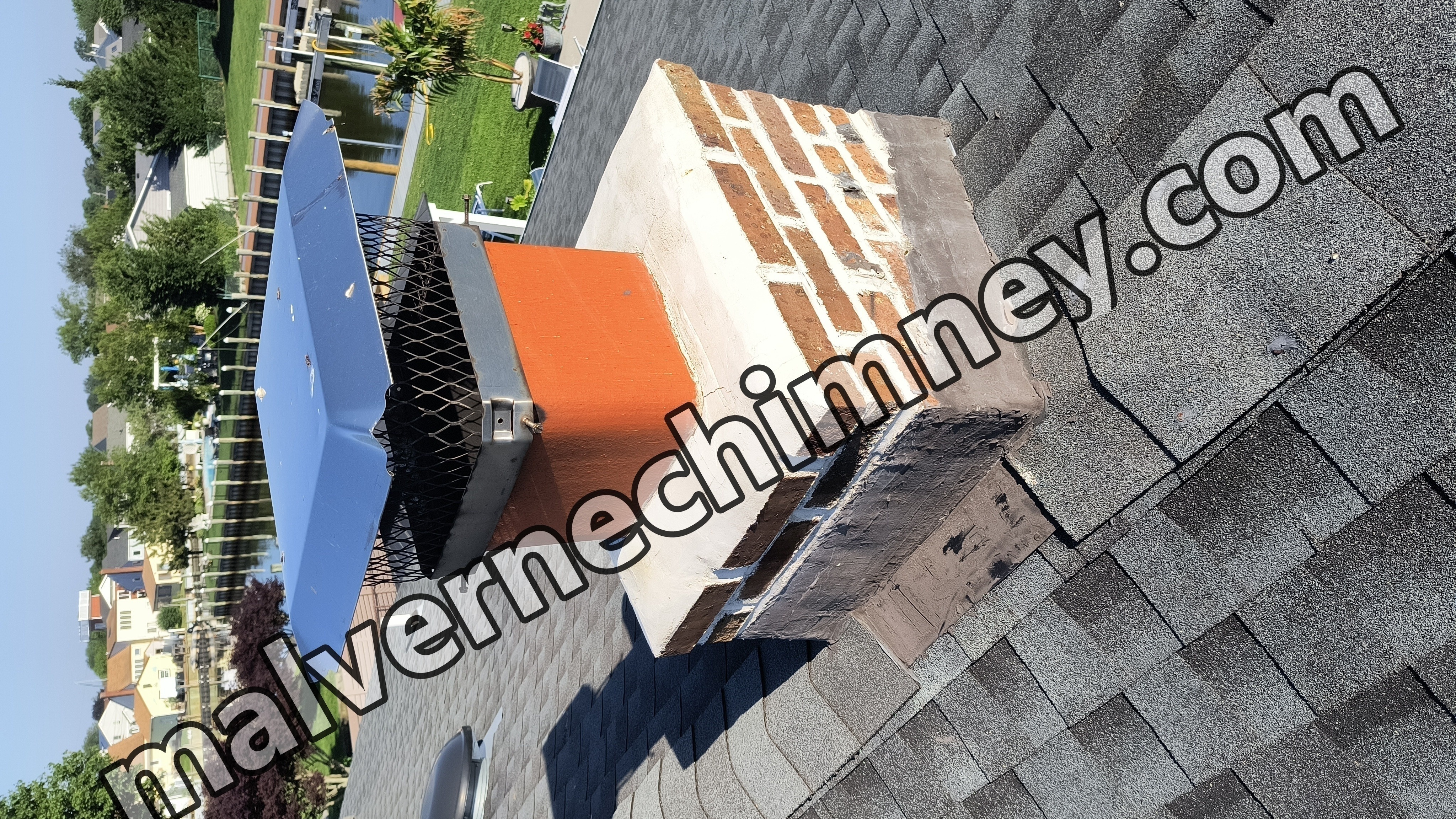 Full chimney masonry rebuild and restoration in Malverne, NY