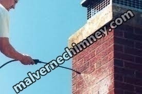 Carbon monoxide safety inspection on gas chimney in Malverne, New York